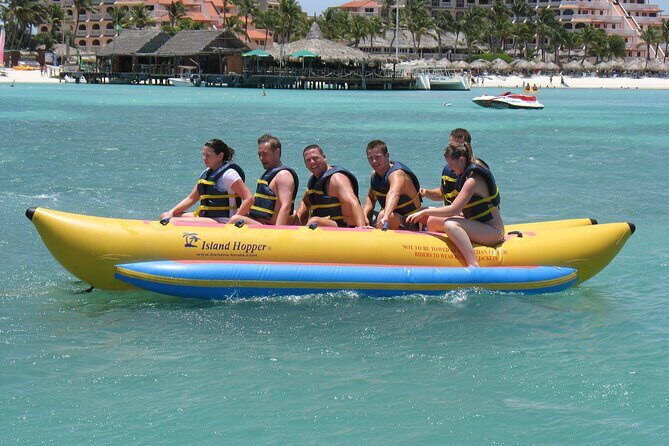 Aruba Banana Boat Fun Ride - Noord Beach Check-In: Delphi Watersports Aruba by the Hyatt Regency Towel Hut