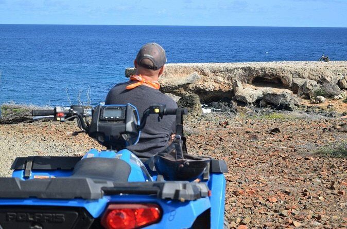 Aruba Off-Road ATV Tour with Cave Pool Swim - Stop 1: Natural Bridge for quick photos and local context