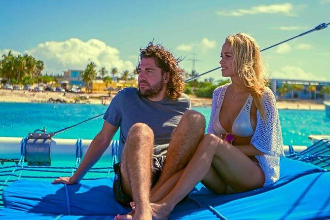 Aruba Sunset Sail Cruise Aboard The Dolphin Catamaran - Open Bar and Snacks: What Comes With the Price